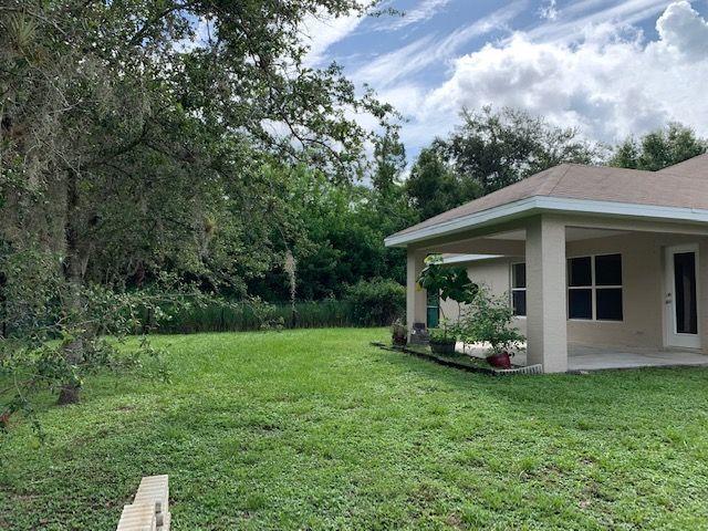 1557 Southwest Fortune Road Port St. Lucie, FL 34953 - Photo 27 of 29 LARGE FENCED REAR YARD
