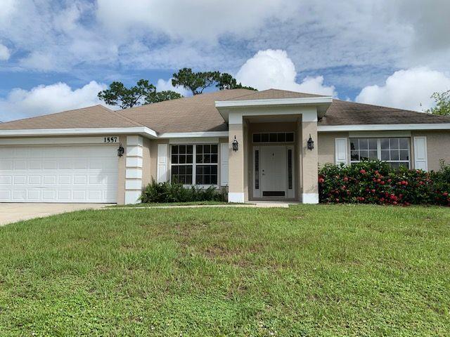 1557 Southwest Fortune Road Port St. Lucie, FL 34953 - Photo 3 of 29 FRONT