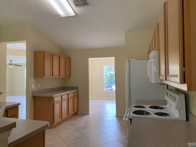 1557 Southwest Fortune Road Port St. Lucie, FL 34953 - Photo 4 of 29 KITCHEN