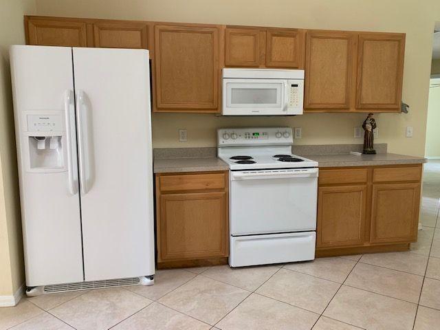 1557 Southwest Fortune Road Port St. Lucie, FL 34953 - Photo 5 of 29 KITCHEN