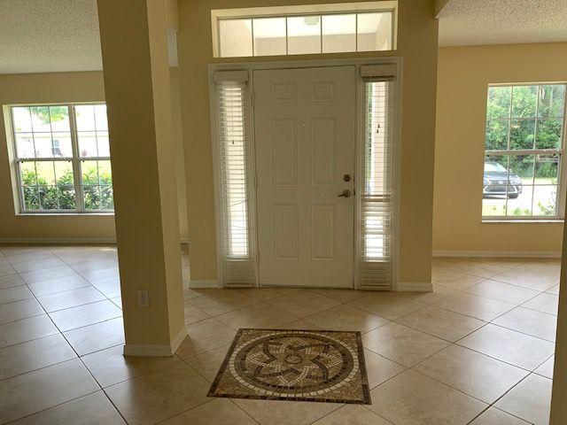1557 Southwest Fortune Road Port St. Lucie, FL 34953 - Photo 7 of 29 ENTRANCE FOYER