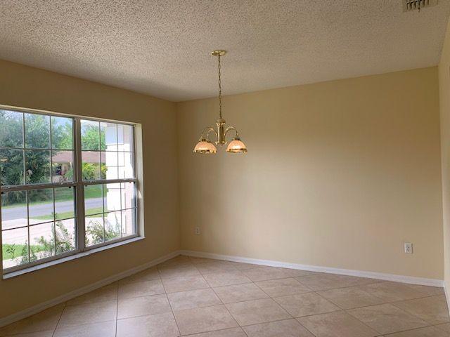 1557 Southwest Fortune Road Port St. Lucie, FL 34953 - Photo 8 of 29 FORMAL DINING ROOM