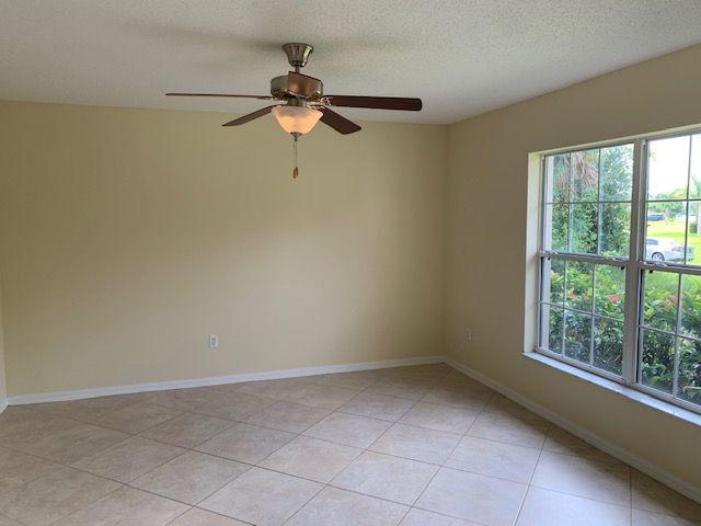 1557 Southwest Fortune Road Port St. Lucie, FL 34953 - Photo 9 of 29 FORMAL LIVING ROOM