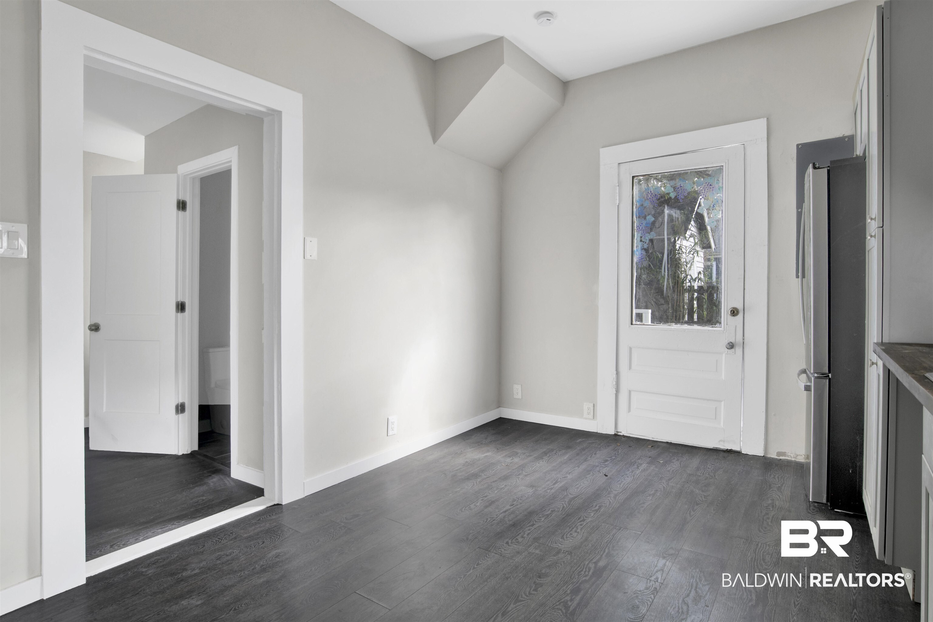 1063 Selma Street Mobile, AL 36604 - Photo 14 of 32 Foyer entrance with dark wood-type flooring