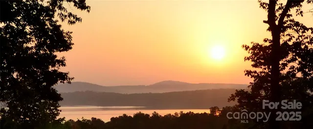 a view of lake with mountain