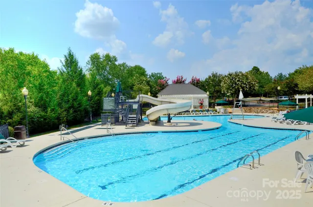 a view of a swimming pool with an outdoor space