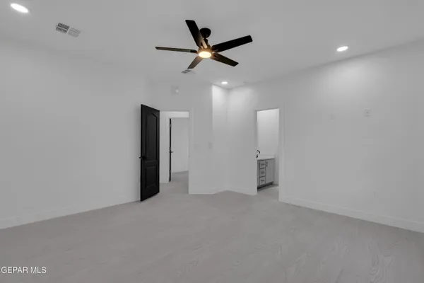 a view of a hallway with closet