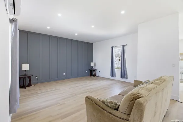 a view of a livingroom with a furniture