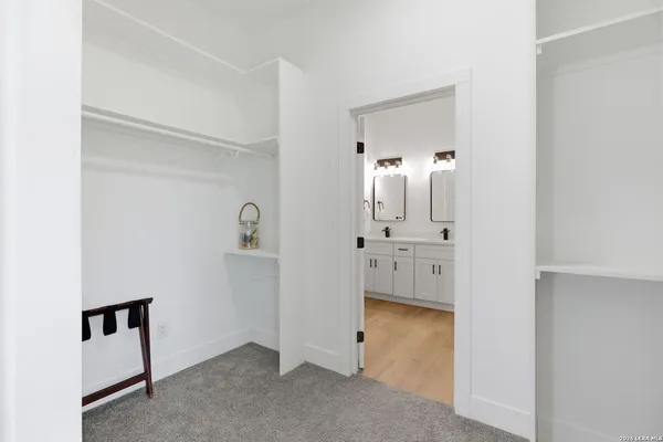 a view of a room with bed