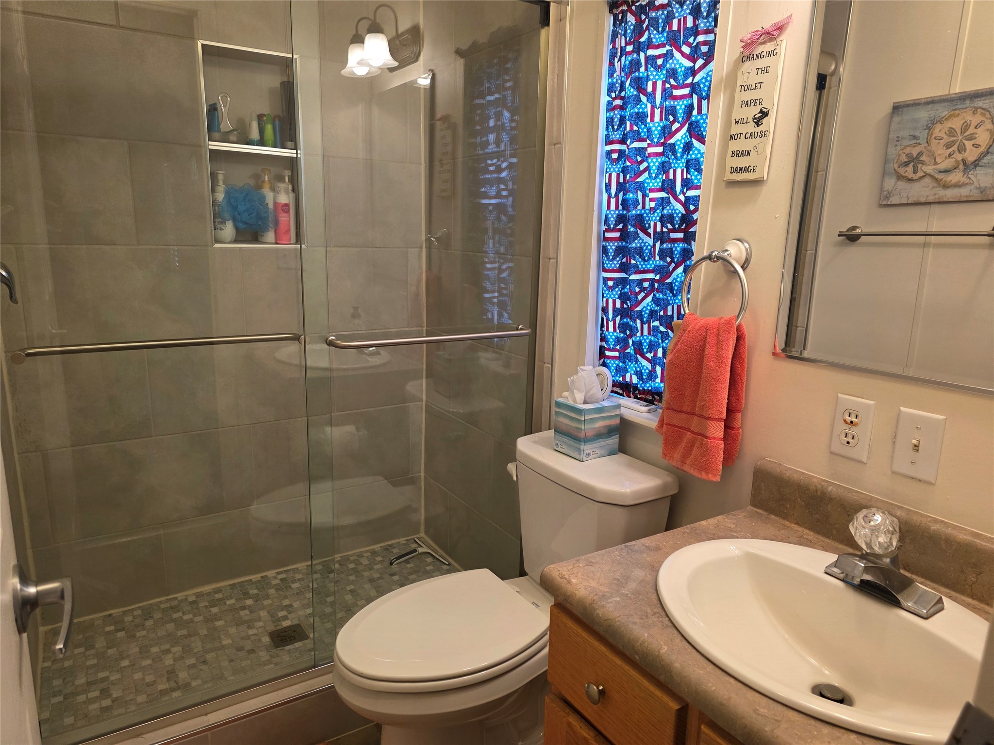 70 Montego Way Point Blank, TX 77364 - Photo 15 of 41 a white toilet sitting next to a bathroom sink