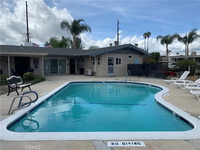 a view of a house with swimming pool