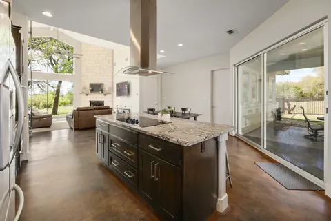 a bedroom with a bed dresser and a window