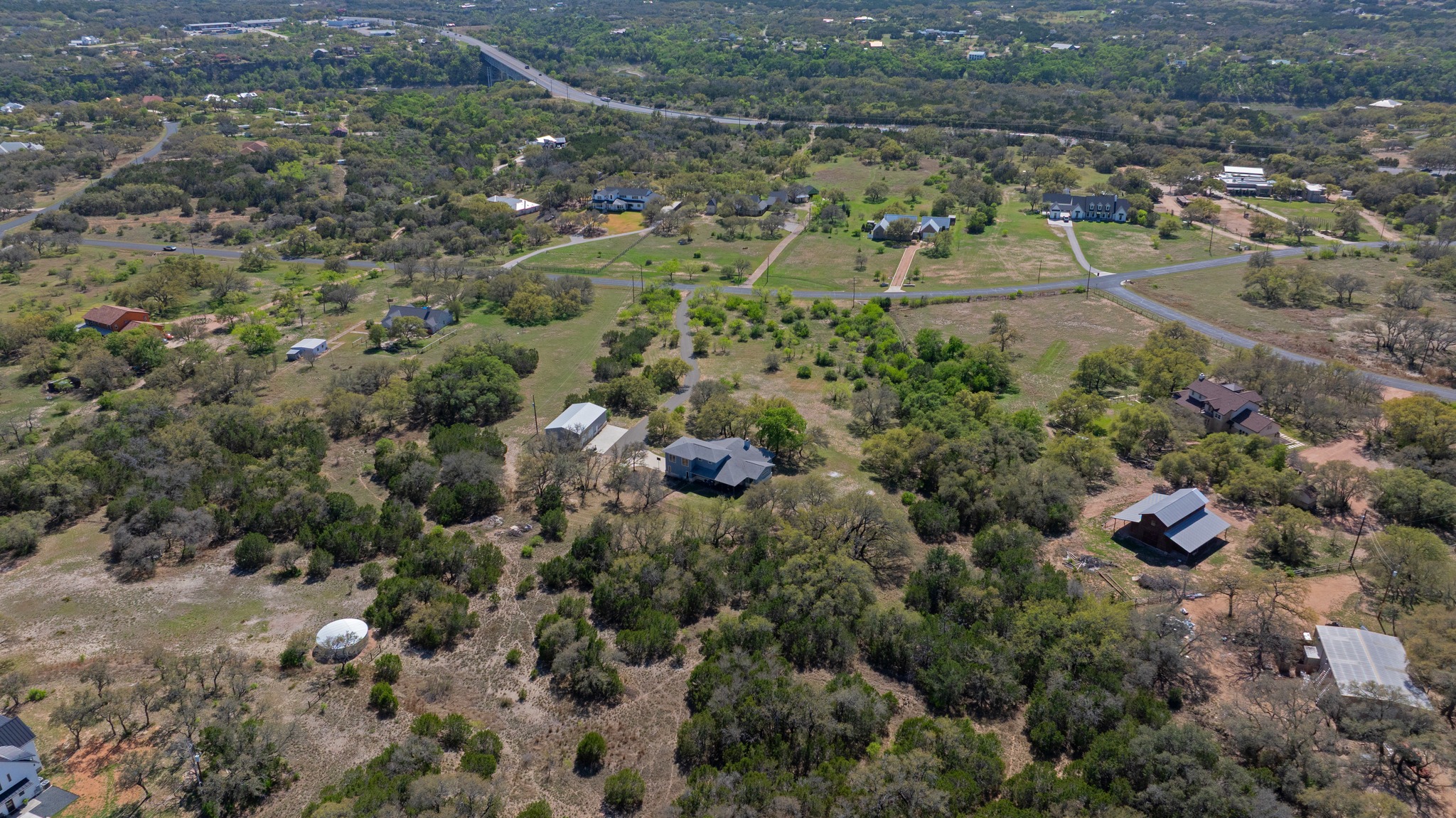 23928 Oscar Road Spicewood, TX 78669 - Photo 36 of 39 an aerial view of multiple house