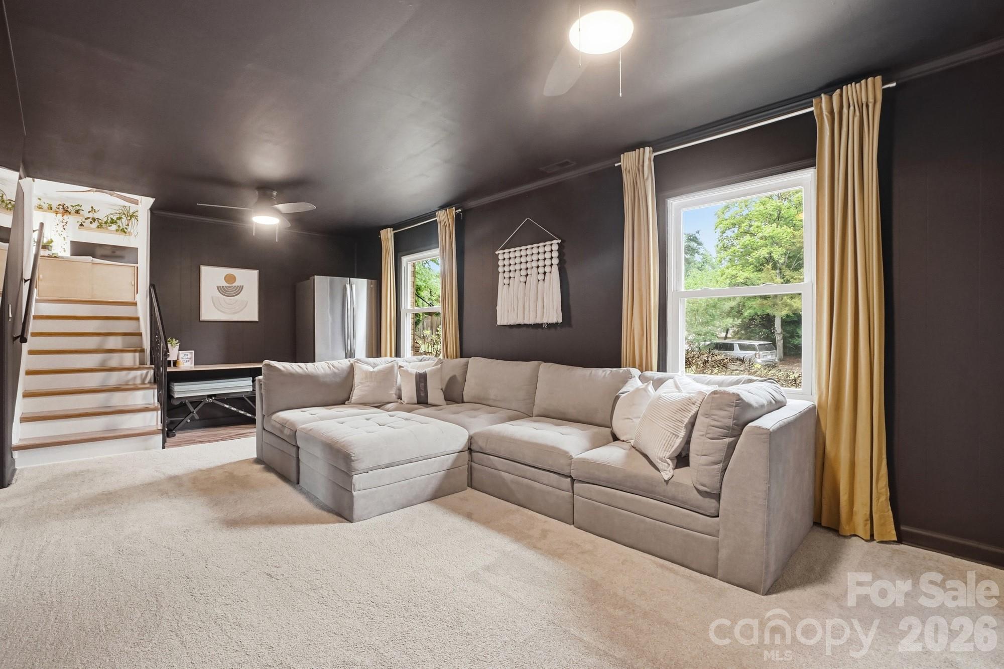 824 Riverwood Road Charlotte, NC 28270 - Photo 21 of 37 a living room with furniture and a large window