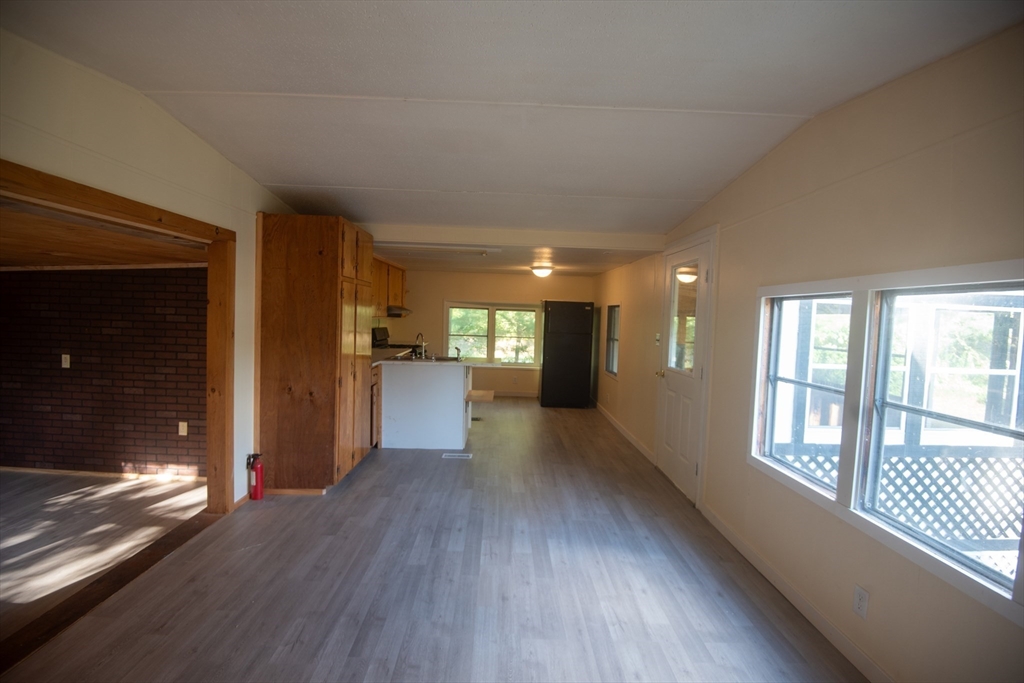 20 Dana Road Barre, MA 01005 - Photo 14 of 38 a view of hallway with wooden floor and windows