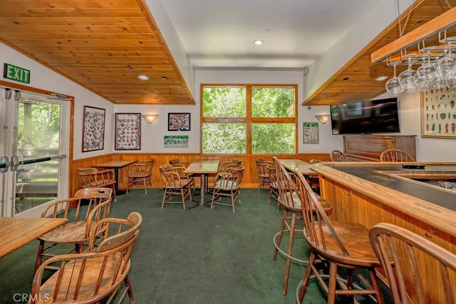 a view of a balcony with wooden stairs