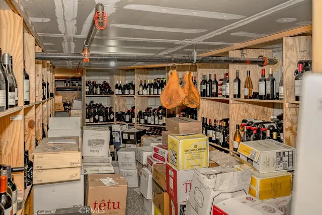 a kitchen with storage and utility