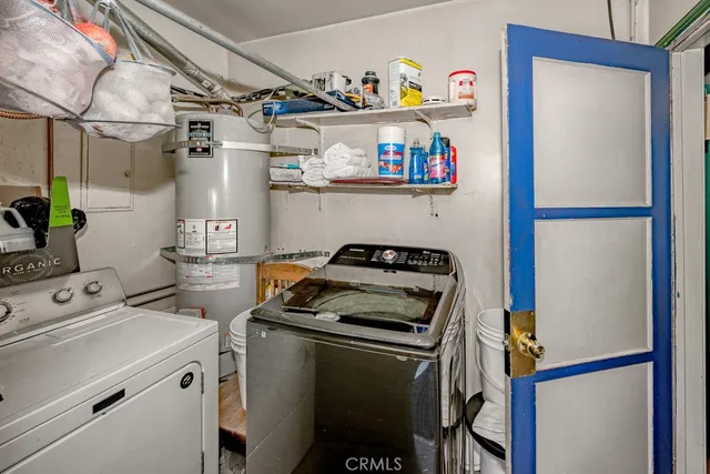 a dining room with furniture a rug and a large window