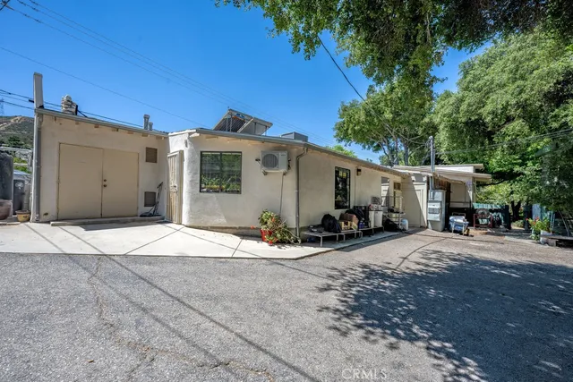 a house view with a backyard space