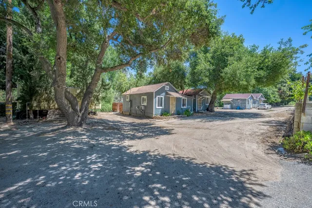 a backyard of a house with lots of green space