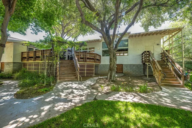 a view of street with parked cars