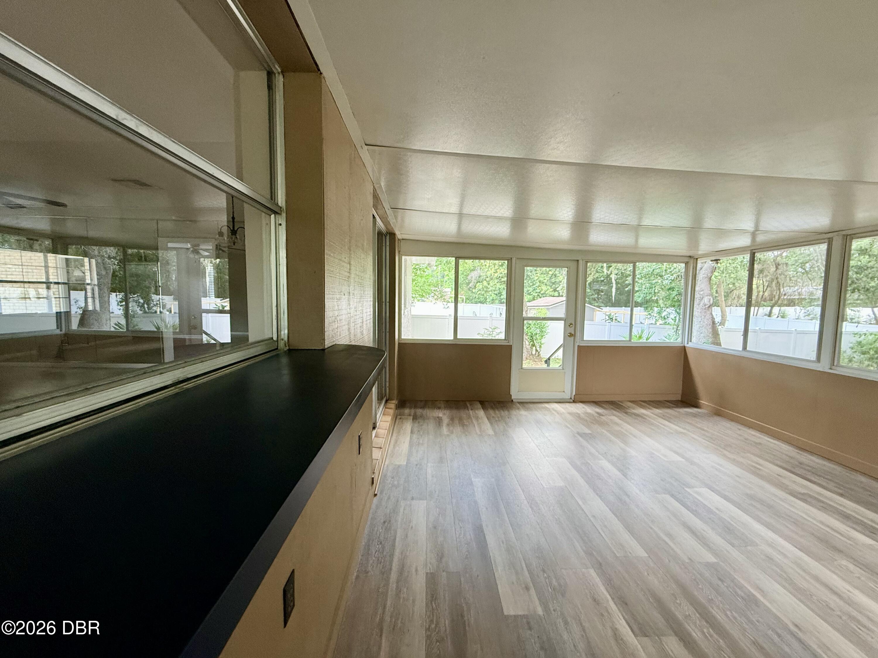 228 Colomba Road DeBary, FL 32713 - Photo 17 of 21 Enclosed Back Porch