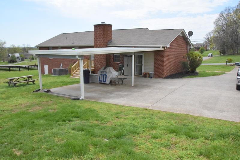 843 Bates Road Lebanon, TN 37087 - Photo 15 of 19 Two car carport/ covered patio with additional room for a basketball court etc.