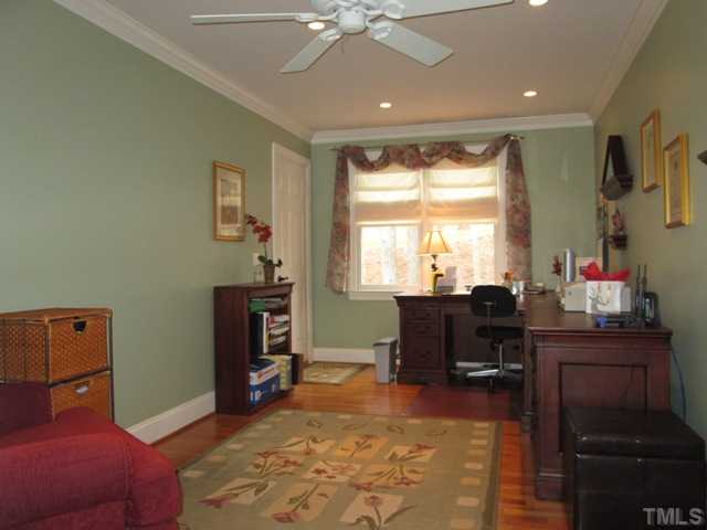 5305 Woodlaurel Court Raleigh, NC 27613 - Photo 15 of 25 Office space 1st floor master features hardwood floors, can lighting, crown molding First floor master could be an in-law, teen, guest, owners master suite...just imagine! This space is incredible! Just get out of bed and go to the office!