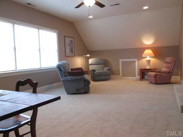5305 Woodlaurel Court Raleigh, NC 27613 - Photo 23 of 25 The bonus room features can lighting, ceiling fan, and cubby storage. This will be a great room for multiple uses, such as a playroom, a craft room, put your pool table here, make it a media room, whatever your heart desires! New carpet!!