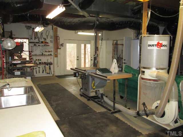 5305 Woodlaurel Court Raleigh, NC 27613 - Photo 7 of 25 This workshop is great for you to make your own and create a space that become a studio to enjoy for whatever your passion may be, wood working, painting, just imagine! There is a sink with water and also french doors provide great light!