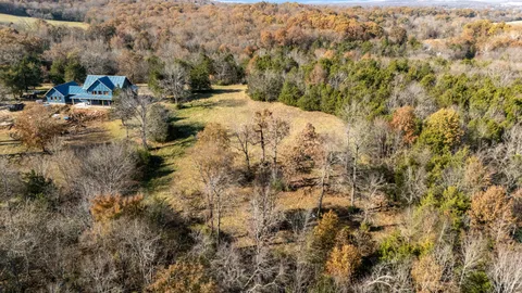 a view of a houses with a yard