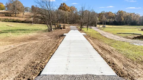 a swimming pool with wooden fence