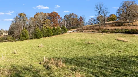 a view of large pool with outdoor space