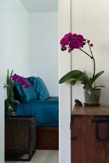 a vase of flowers sitting on a table