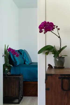 a vase of flowers sitting on a table