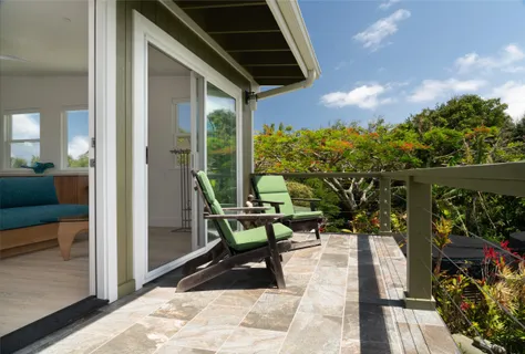 a view of a porch with furniture
