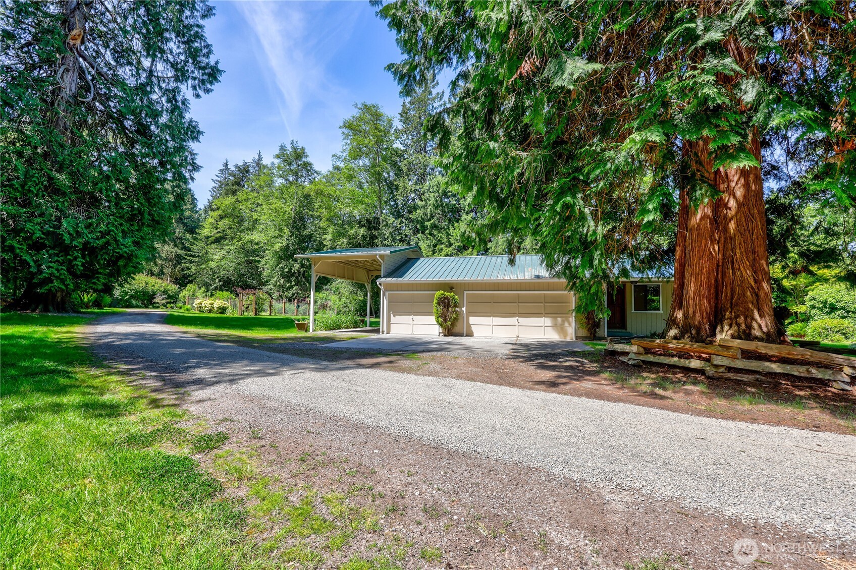 252 Jansen Road Nordland, WA 98358 - Photo 34 of 40 a view of a house with outdoor space and tree s