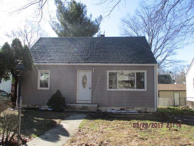 223 Pitt Street Bridgeport, CT 06606 - Photo 1 of 1 a front view of a house with a yard