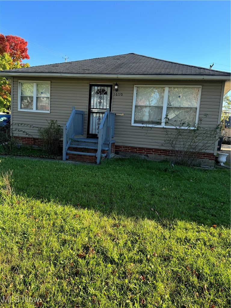 16110 Seville Road Cleveland, OH 44128 - Photo 1 of 25 View of front of property with a front yard