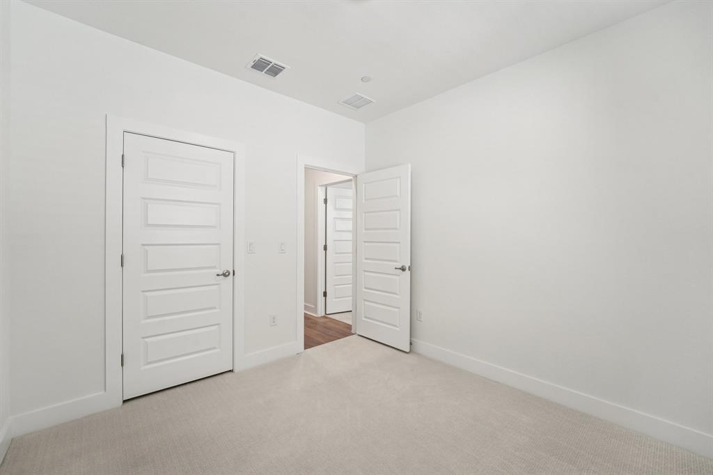 200 West 56th Street, Unit 8101 Austin, TX 78751 - Photo 11 of 13 There are two secondary bedrooms on the upper level, one with its own ensuite. (Sample photo of finishes and layout)