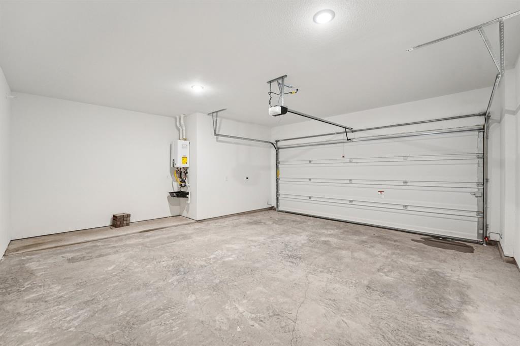 200 West 56th Street, Unit 8101 Austin, TX 78751 - Photo 13 of 13 Finding a spacious 2-car garage
in this area is a rare gem! (Sample photo of finishes and layout)