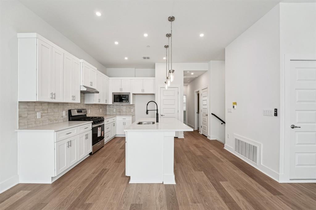 200 West 56th Street, Unit 8101 Austin, TX 78751 - Photo 4 of 13 Every detail shows-off sophisticated design, modern
style, and a focus on easy city living. (Sample photo of finishes and layout)