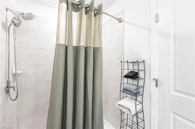 a bedroom with a bed and a cabinets