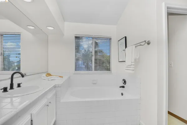 a bathroom with a sink and a bathtub