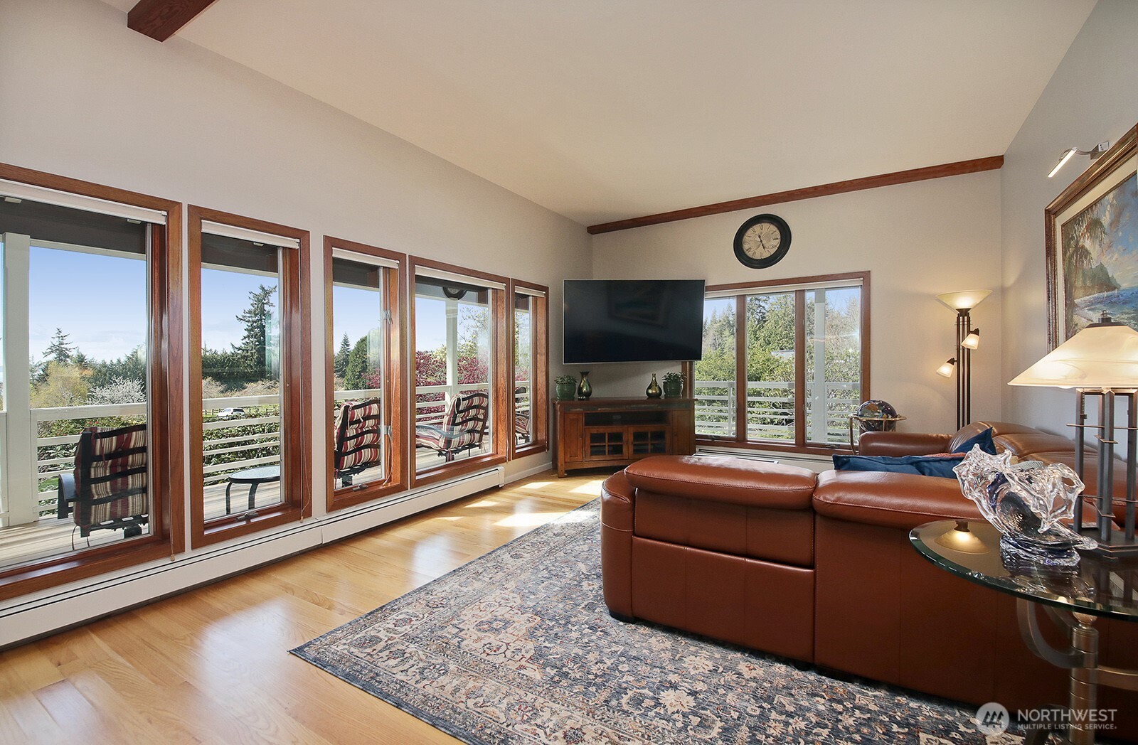 5741 Crow Haven Road Langley, WA 98260 - Photo 27 of 40 a living room with furniture and a flat screen tv