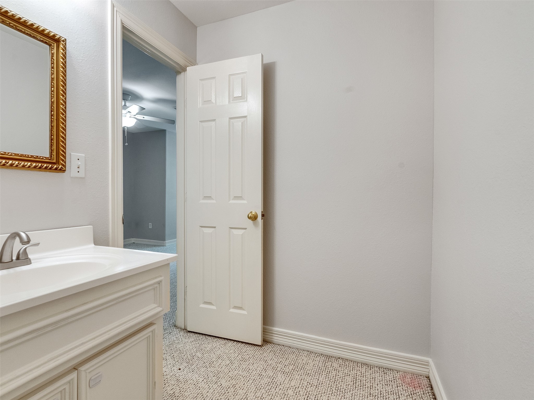 22872 Mersey Court Porter, TX 77365 - Photo 32 of 48 a bathroom with a sink and a mirror