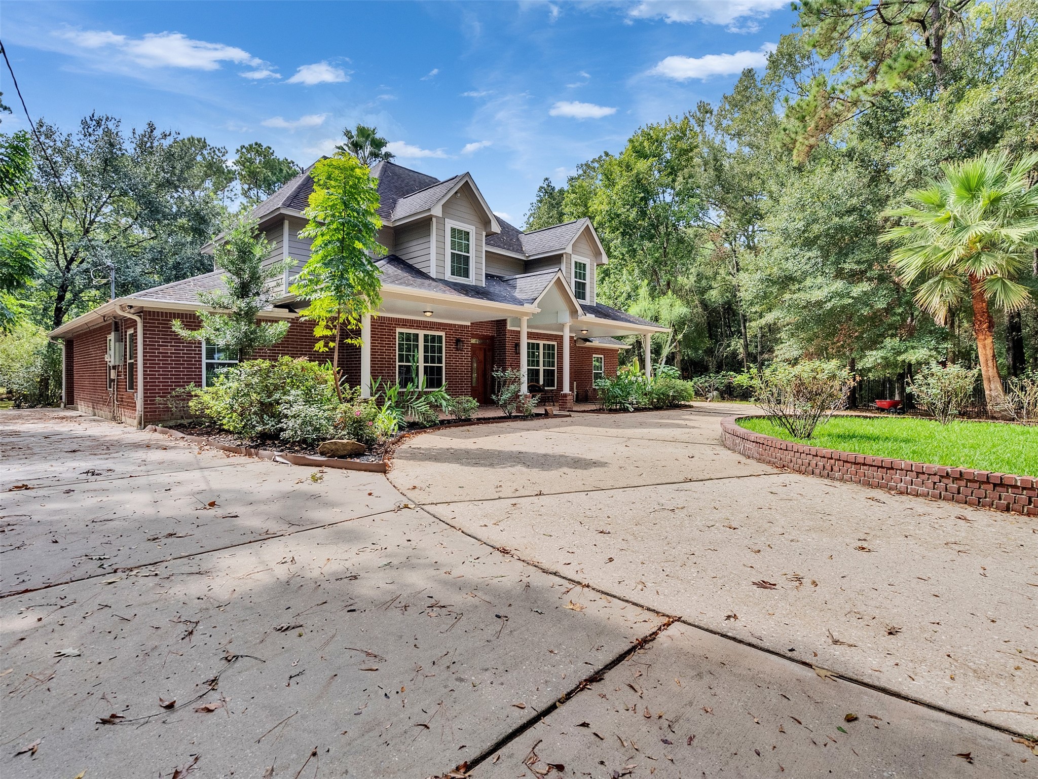 22872 Mersey Court Porter, TX 77365 - Photo 4 of 48 front view of a house with a street