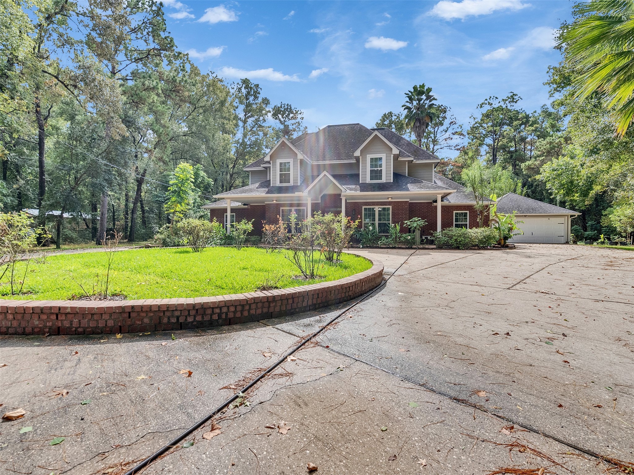 22872 Mersey Court Porter, TX 77365 - Photo 48 of 48 a view of a house with a yard and potted plants