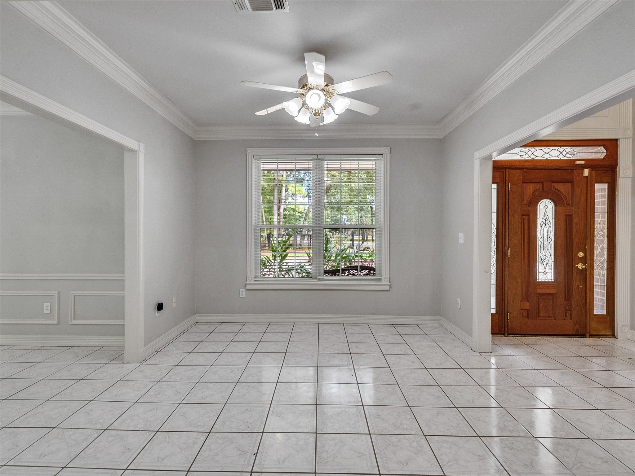 22872 Mersey Court Porter, TX 77365 - Photo 5 of 48 a view of an empty room with window and chandelier fan