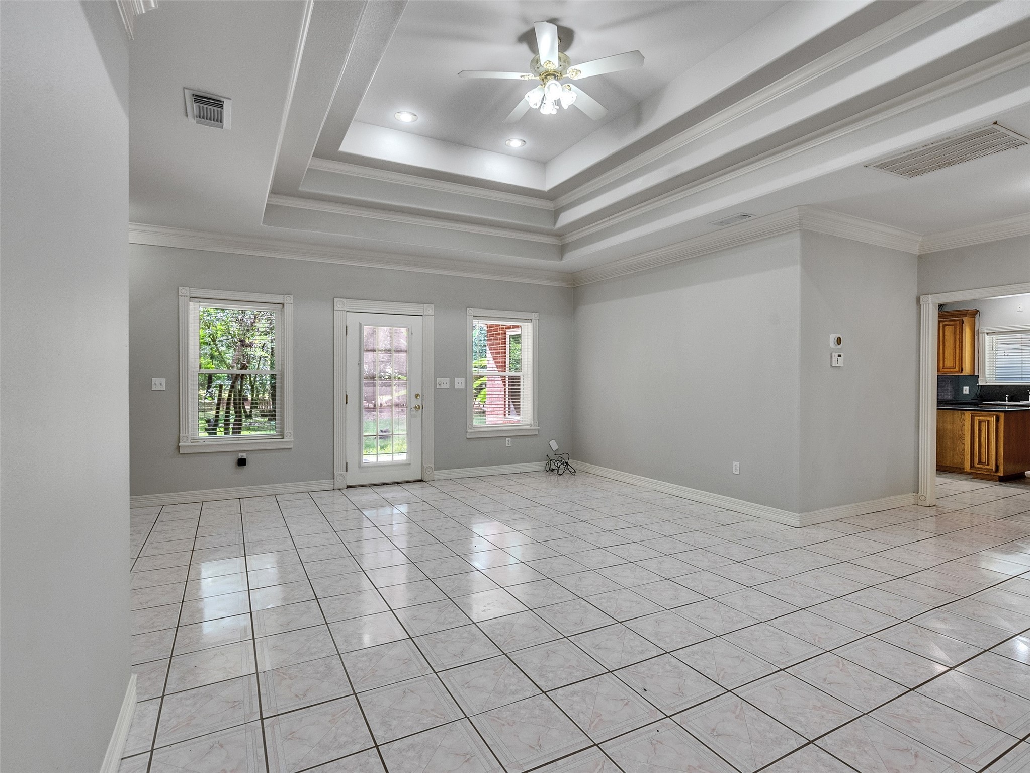 22872 Mersey Court Porter, TX 77365 - Photo 8 of 48 a view of an empty room with window and chandelier fan